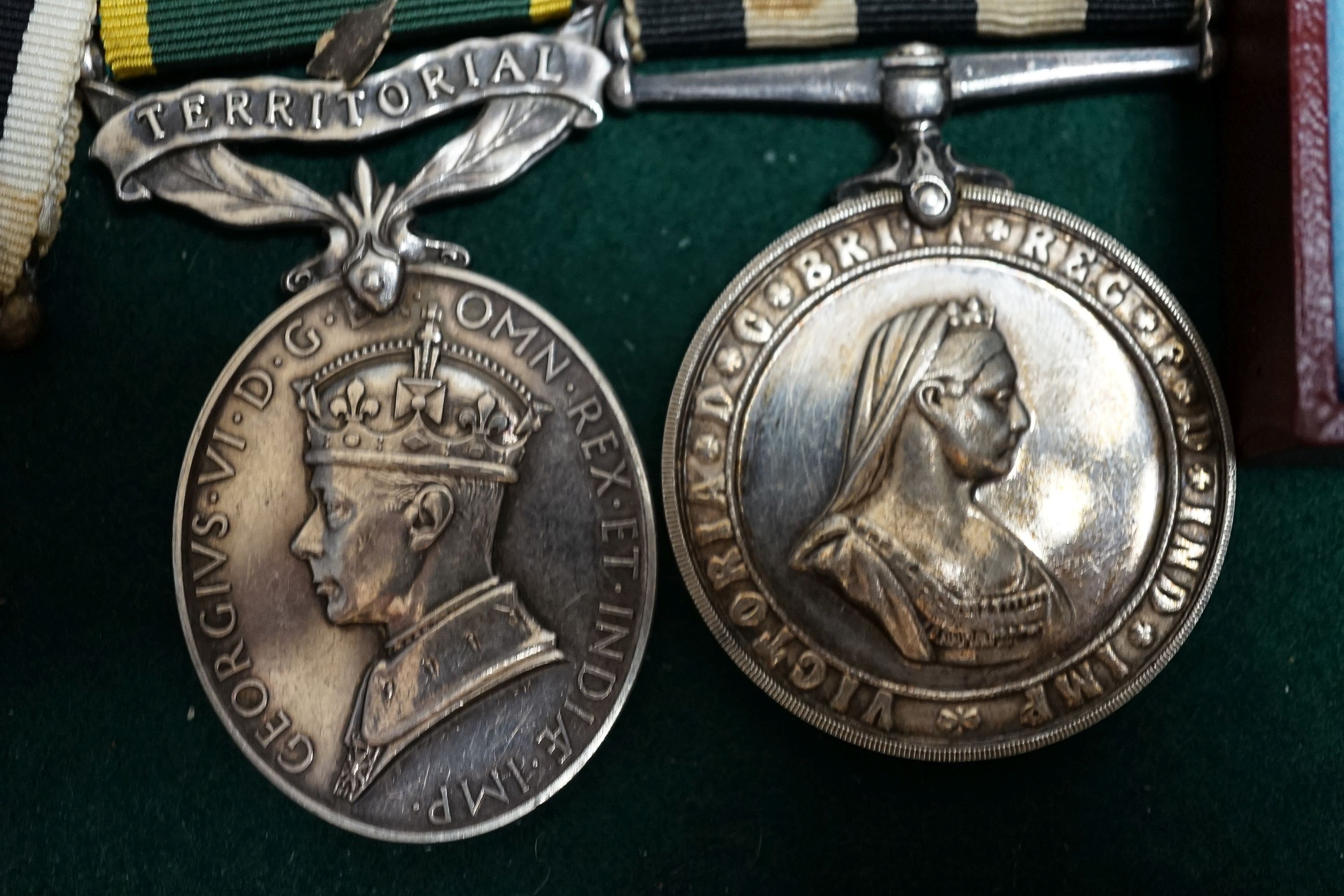 A George VI Efficiency medal to 885238 SJT. R. .BURRIDGE .R.A. various unnamed WW2 medals and miniatures